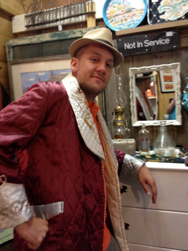 Mike trying on stuff at the antiques store